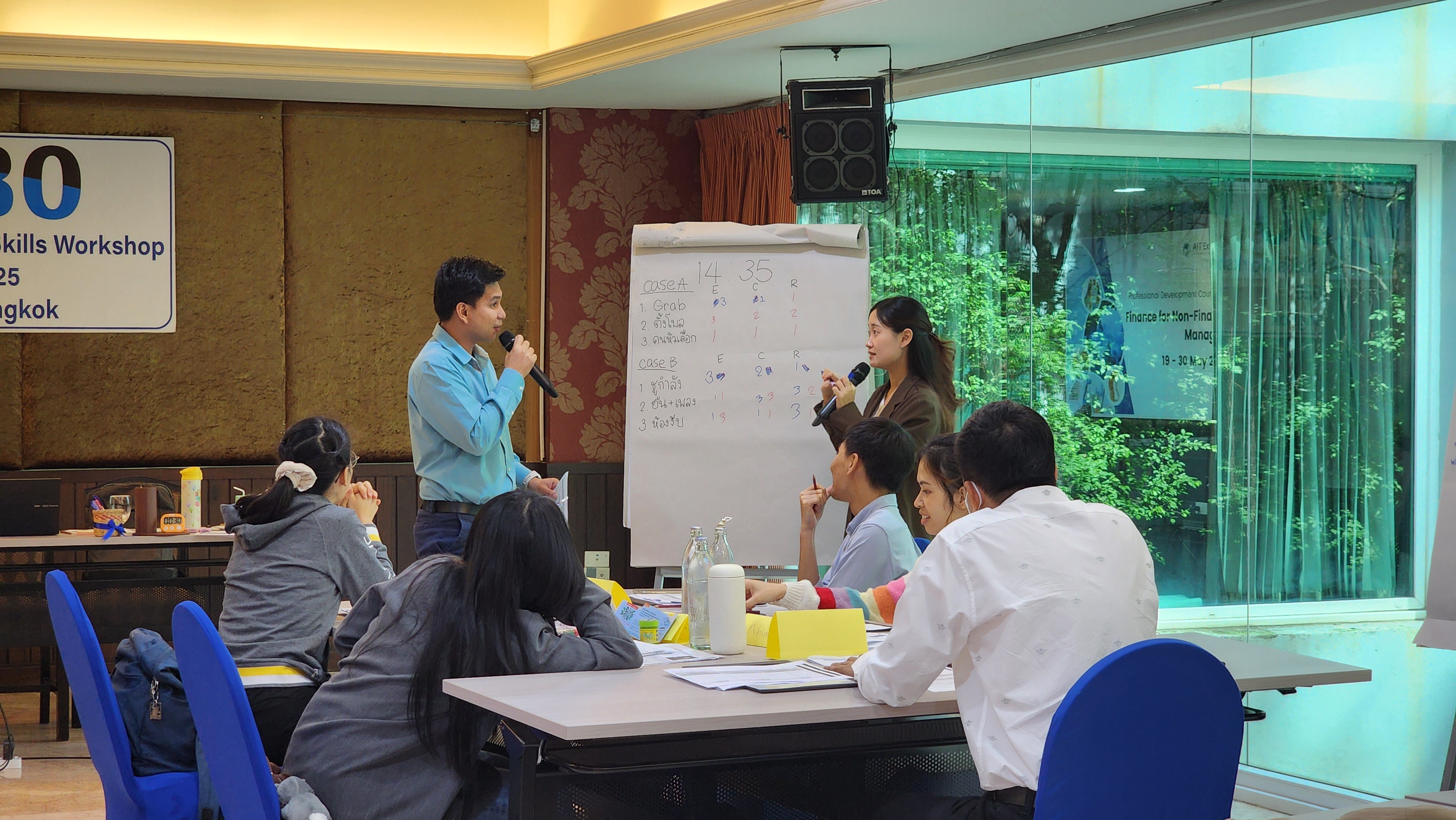 Toyobo Thailand employees collaborating in problem-solving activities